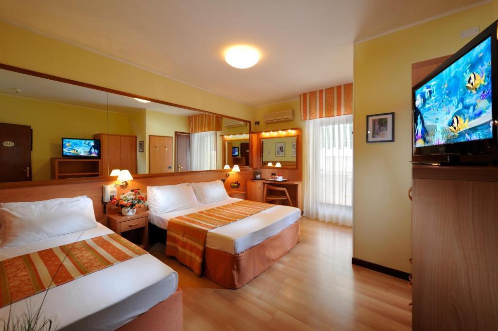Hotel Al Prater Lignano Sabbiadoro Habitación foto